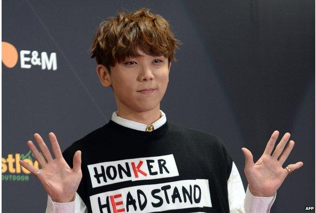 Members of South Korean K-Pop singer Junggigo poses during a press conference prior to attending the K-Pop chart show 'M Countdown' at the Yokohama Arena in Yokohama, Kanagawa prefecture on 2 April 2014.