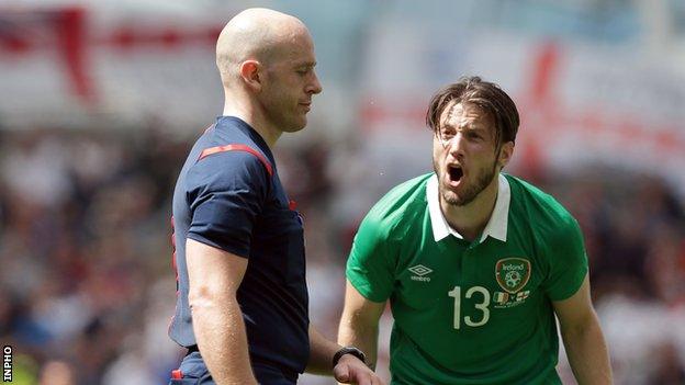 Harry Arter makes a penalty appeal to referee Arnold Hunter during last Sunday's friendly against England