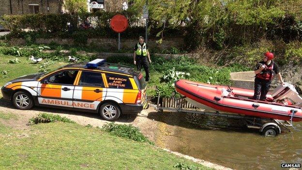 Steve Hobbs on left, Adam Evans in the boat, Paul Arnill in the car