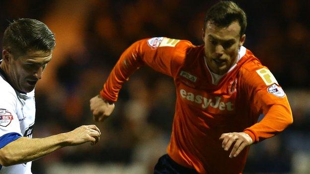 Shaun Whalley tries to keep up with Bury's Ryan Lowe