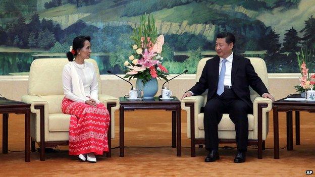 Aung San Suu Kyi and Xi Jinping in Beijing on 11 June 2015