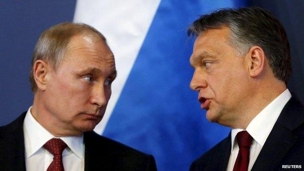 Russian President Vladimir Putin (left) listens to Hungarian Prime Minister Viktor Orban before a joint news conference in Budapest in February 2015