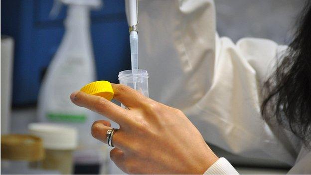 Woman working in science lab