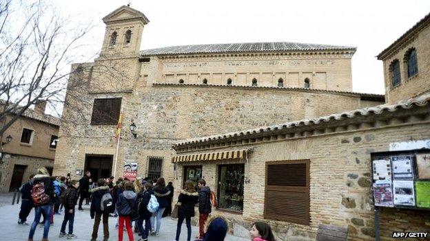 Children stand near "El Transito" synagogue and Sephardic Museum in Toledo, Spain