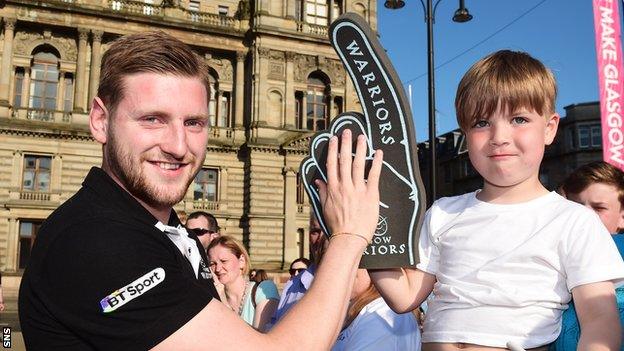 Finn Russell meets a young Glasgow Warriors fan