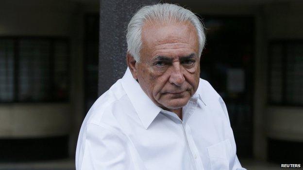 Former FMI head Dominique Strauss-Kahn enters his car as he leaves his apartment in Paris, France, on 12 June 2015.