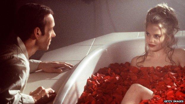 Spacey starring in American Beauty alongside Mena Suvari