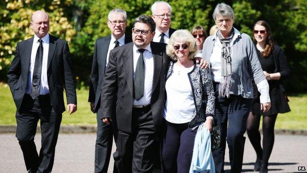 Mourners arrive for the funeral