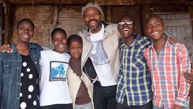 Sir Lenny Henry with young Kenyans