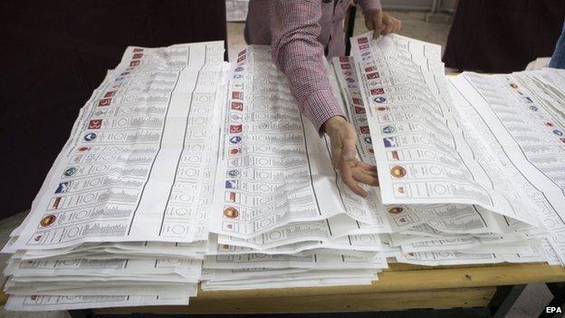 Officials count votes after the close of voting in Istanbul, Turkey on 7 June 2015