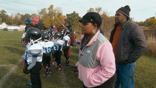 Brenda Myers-Powell watching a football game