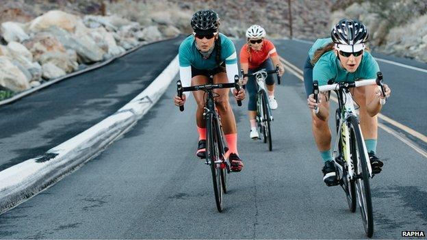 Female cyclists wearing Rapha clothing