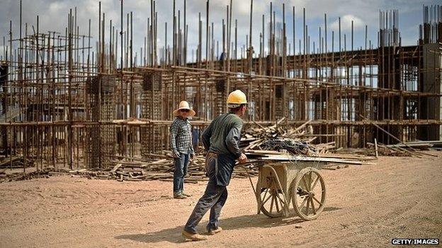 Chinese workers working on railway infrastructure on the new railway tracks linking Djibouti with Addis Ababa