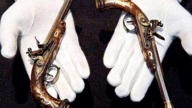 A pair of gold-encrusted pistols belonging to the son of Napoleon Bonaparte