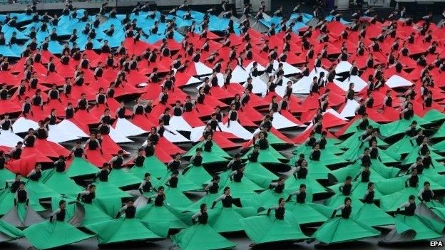 Dancers form a huge Azeri flag at the opening of the European Games