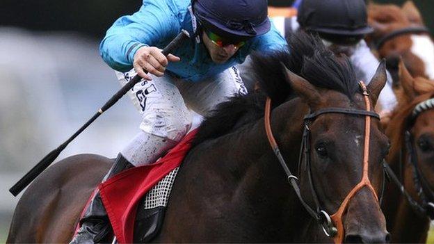 Brown Panther and jockey Richard Kingscote