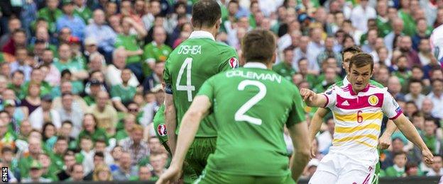 Shaun Maloney's shot hits John O'Shea and finds its way past Shay Given