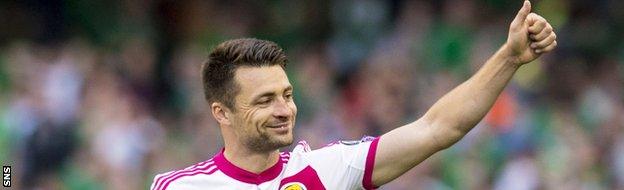 Russell Martin gives a thumbs-up to the Scotland fans at full-time