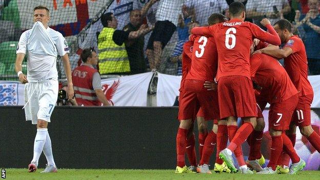 England celebrate scoring against Slovenia