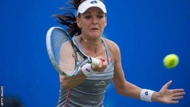 Agnieszka Radwanska returns