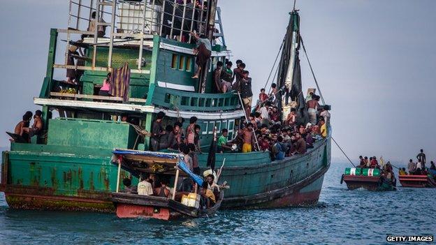 Rohingya migrants resting on a boat off the coast near Kuala Simpang Tiga in Indonesia's East Aceh district of Aceh province before being rescued, May 2015.