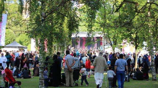 People gather around the main stage