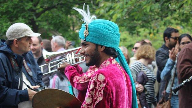 A man playing cymbals