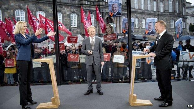 Danish Prime Minister Helle Thorning-Schmidt and and opposition leader Lars Loekke Rasmussen (R) take part in their first one-on-one debate during the Danish election in Copenhagen on May 31, 2015.