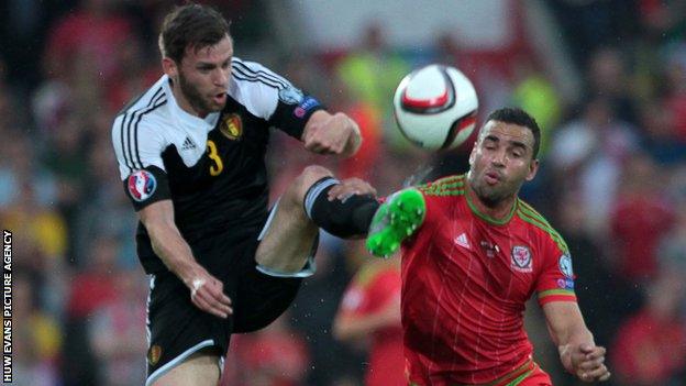 Hal Robson-Kanu of Wales challenges Nicolas Lombaerts of Belgium