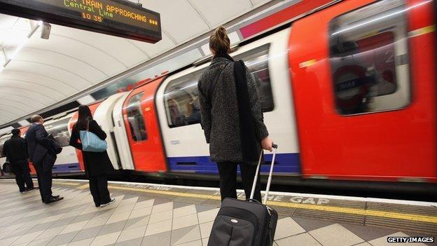 Commuters at a London Underground station