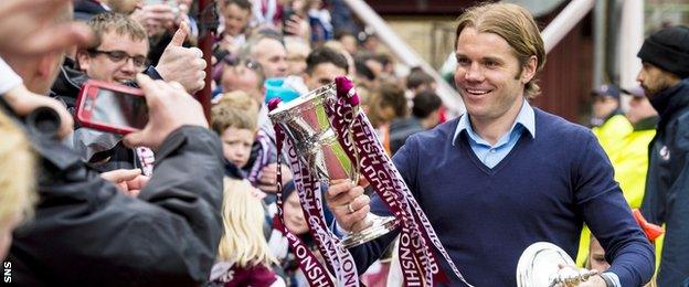 Hearts head coach Robbie Neilson with the Scottish Championship trophy