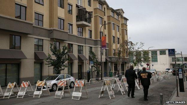 Police walking near the scene