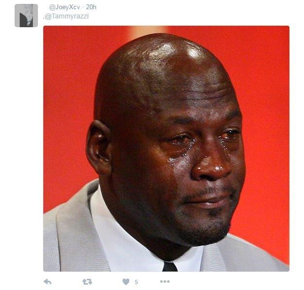 The tweet is a photo of a man crying.