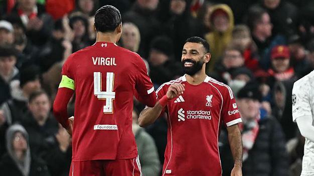 Virgil van Dijk and Mohamed Salah celebrate