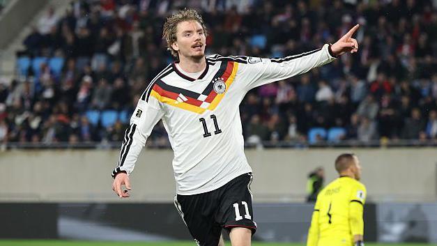Nick Woltemade celebrates scoring for Germany against Luxembourg