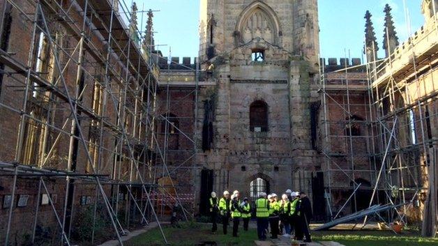 Visitors in Bombed Out Church