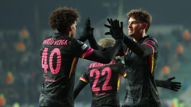 Chelsea players celebrate scoring against Astana