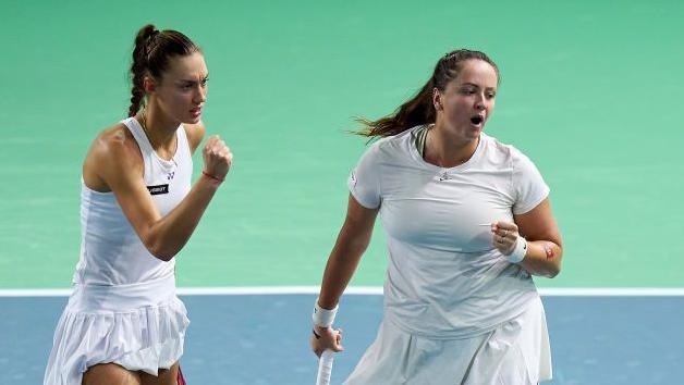 Slovakia's Viktoria Hruncakova and Tereza Mihalikova celebrate