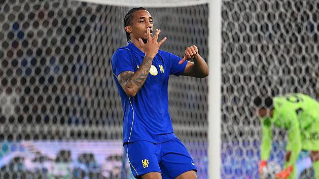 Chelsea forward Joao Pedro celebrates scoring against AC Milan