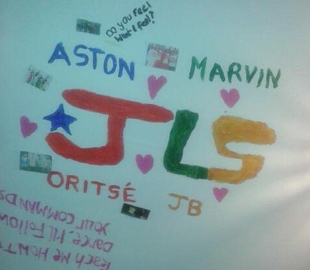 Gabirelle's ceiling painted to say JLS