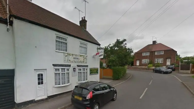 A street view of East Lane in Edwinstowe, Nottinghamshire, outside the Hammer and Wedge pub on the left of the frame.