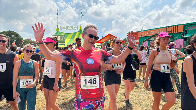 Festival-goer in running gear at festival 