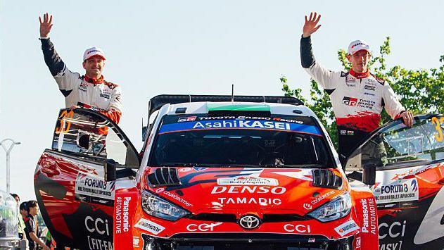 Elfyn Evans (right) celebrates victory at Rally Japan with co-driver Scott Martin