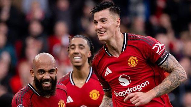 Manchester United striker Benjamin Sesko (right) celebrates his goal against Sunderland at Old Trafford