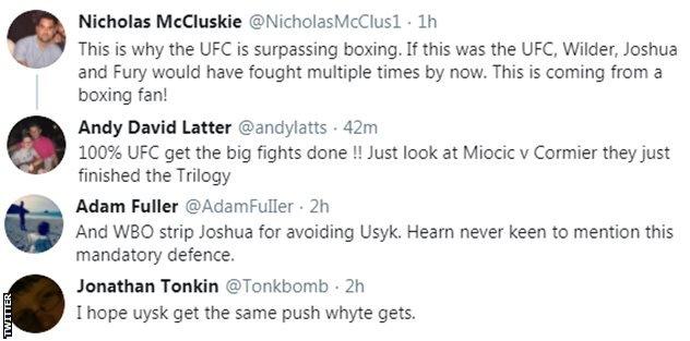 Boxing fans on Twitter react to Eddie Hearn's comments that Dillian Whyte could face Anthony Joshua. One fan says boxing can learn from UFC, which makes big fights happen. Another fan points out that Oleksandr Usyk, the WBO mandatory, could get a shot first.