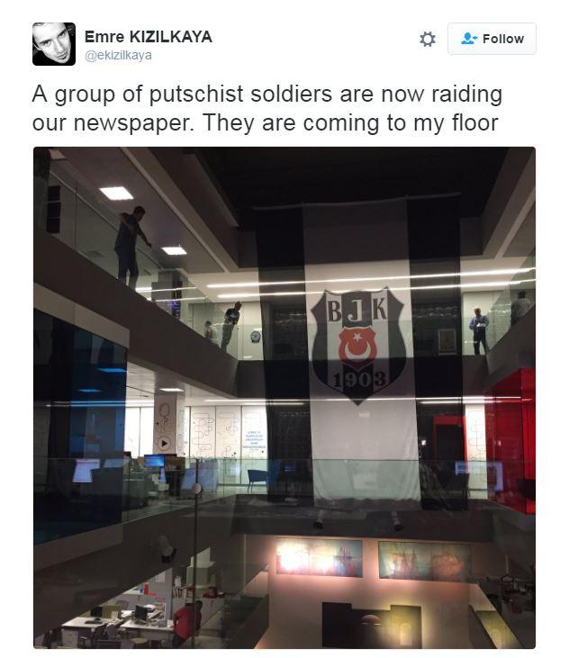 A tweet from a journalist describing soldiers raiding his paper