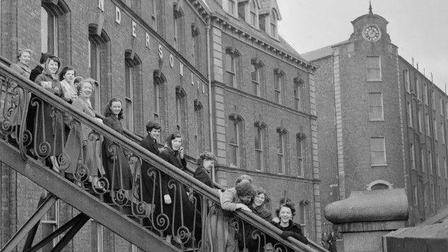 Workers seen leaving Tillie and Henderson's shirt factory in November 1955