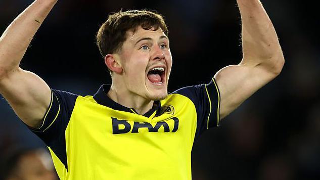 Will Lankshear celebrates after Oxford score a goal