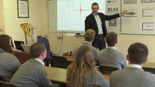 Brendan O'Donoghue talking to his class about earthquakes