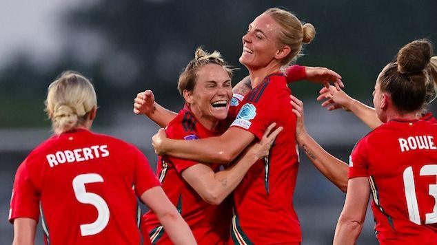 Wales forward Jess Fishlock celebrates with Rhiannon Roberts, Sophie Ingle and Rachel Rowe